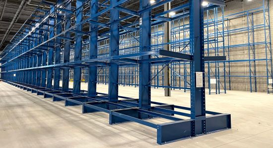 A spacious warehouse featuring cantilever racking for efficient storage.