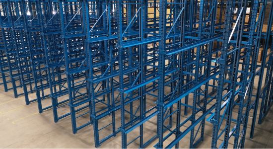 A drive-in racking system displayed in a vast warehouse