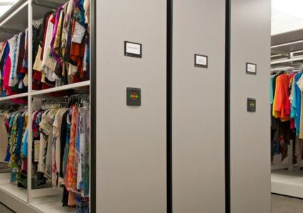 Mobile storage system showcasing clothing racks in a large room.