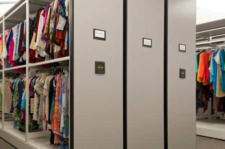 Mobile storage system showcasing clothing racks in a large room.