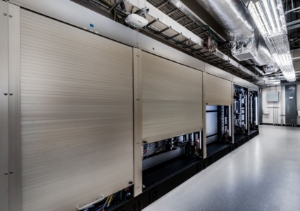 Large room including security shutters for storing technical equipment.