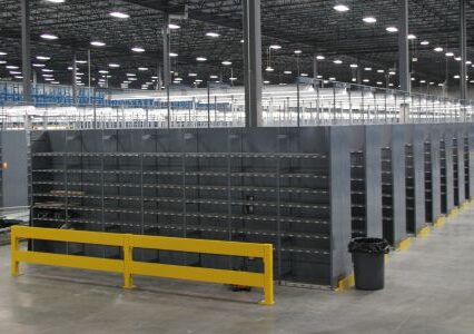 An expansive warehouse housing countless shelves and racks, featuring type 1 shelving.