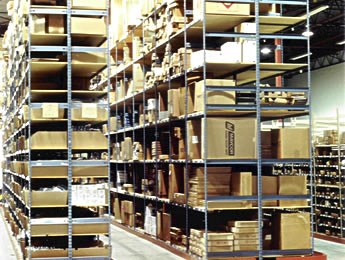 Side view of E-Z rect warehouse shelving system with boxes on the shelves