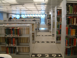 An entire library filled with Cantilever Library space saver shelving full of books
