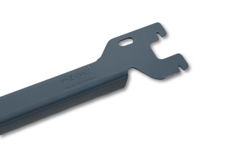 A close-up, angled view of a dark gray E-Z-Rect Type 1 frame connector medium duty bar shows its "e-z-rect" embossing.