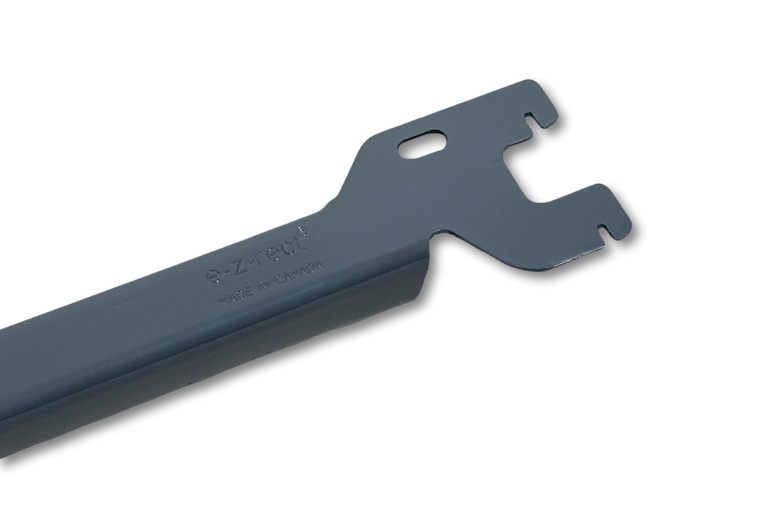 A close-up, angled view of a dark gray E-Z-Rect Type 1 frame connector medium duty bar shows its "e-z-rect" embossing.