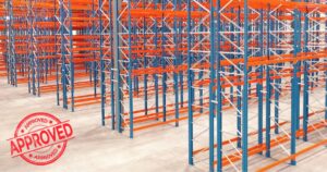 Selective pallet racking system in warehouse with stamp of approval