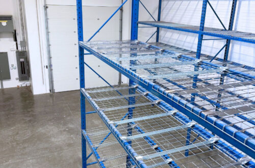 Hi-Cube-Storage-Aerospace-Case-Study-Langley-BC-2 Closeup shot of a blue colored selective pallet racking