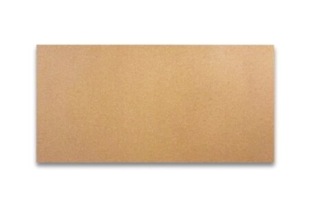 A rectangular particle board shelf with a light brown, speckled surface is horizontally centered against a white background.