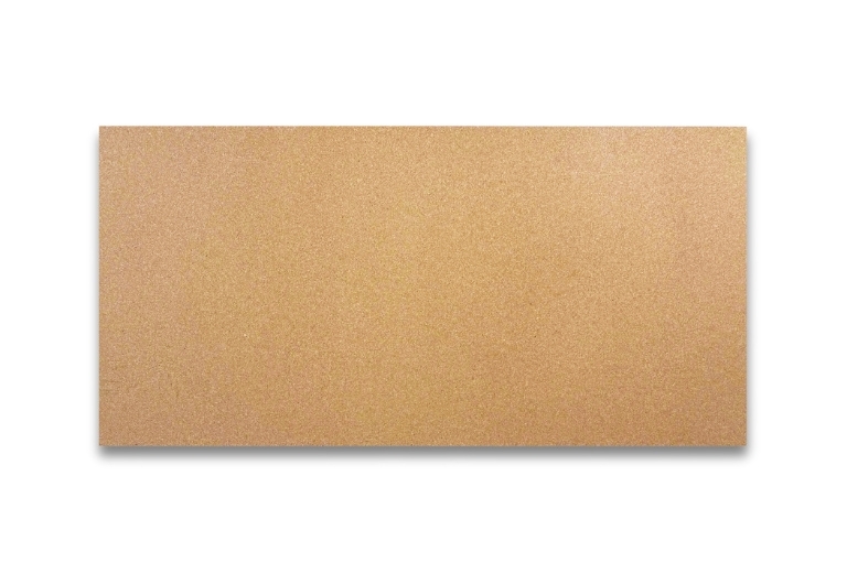 A rectangular particle board shelf with a light brown, speckled surface is horizontally centered against a white background.